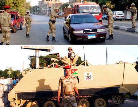 Erste Armee-Checkpoints in Gizeh nahe Kairo. Fotos: AP Erste Armee-Checkpoints in Gizeh nahe Kairo. Fotos: AP
