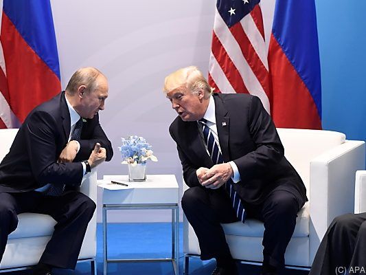 Russlands Präsident Putin mit US-Präsident Trump Russlands Präsident Putin mit US-Präsident Trump