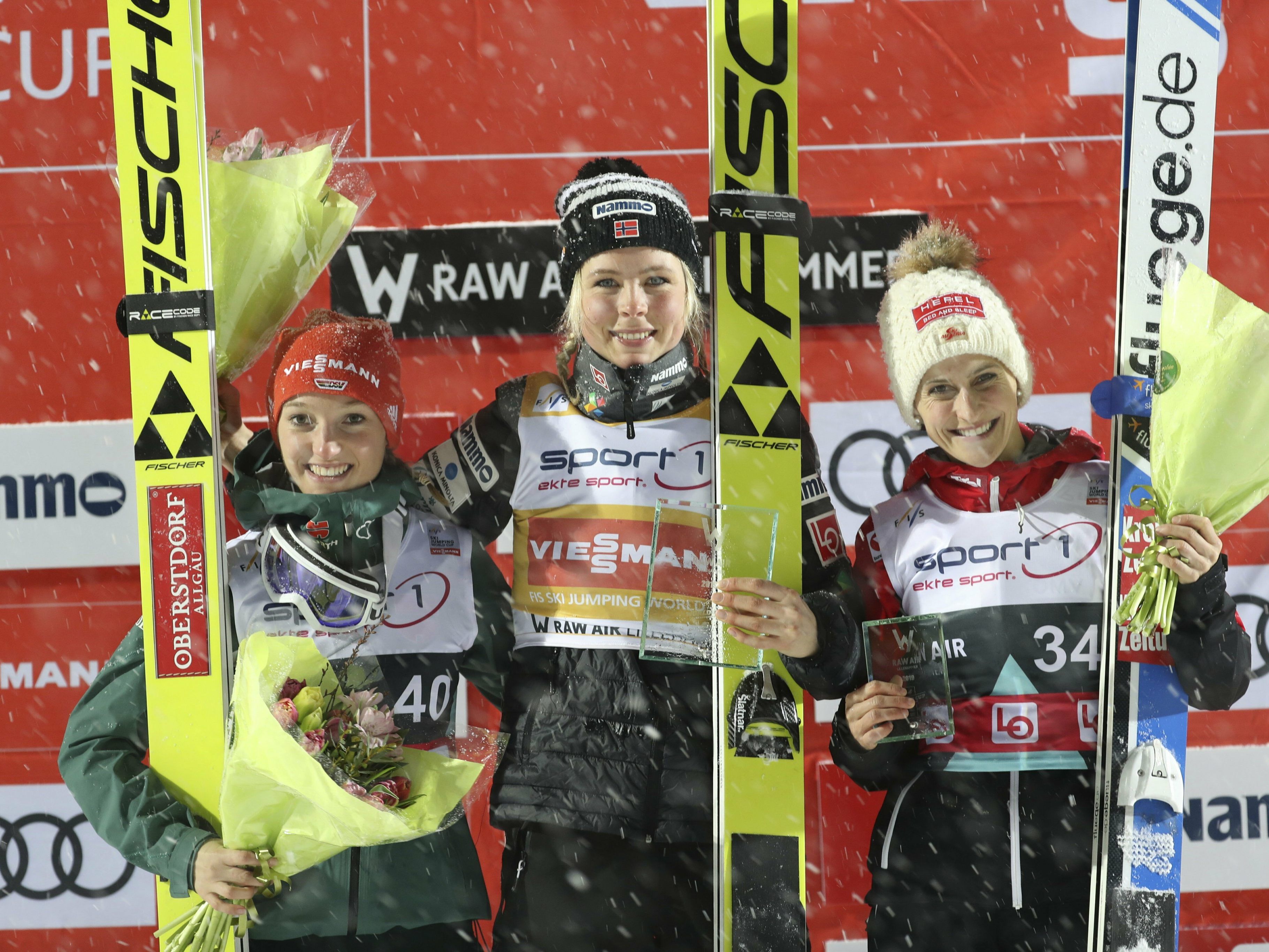 From left, second place Katharina Althaus (GER), first placed Maren Lundby (NOR) and third placed Eva Pinkelnig (AUT