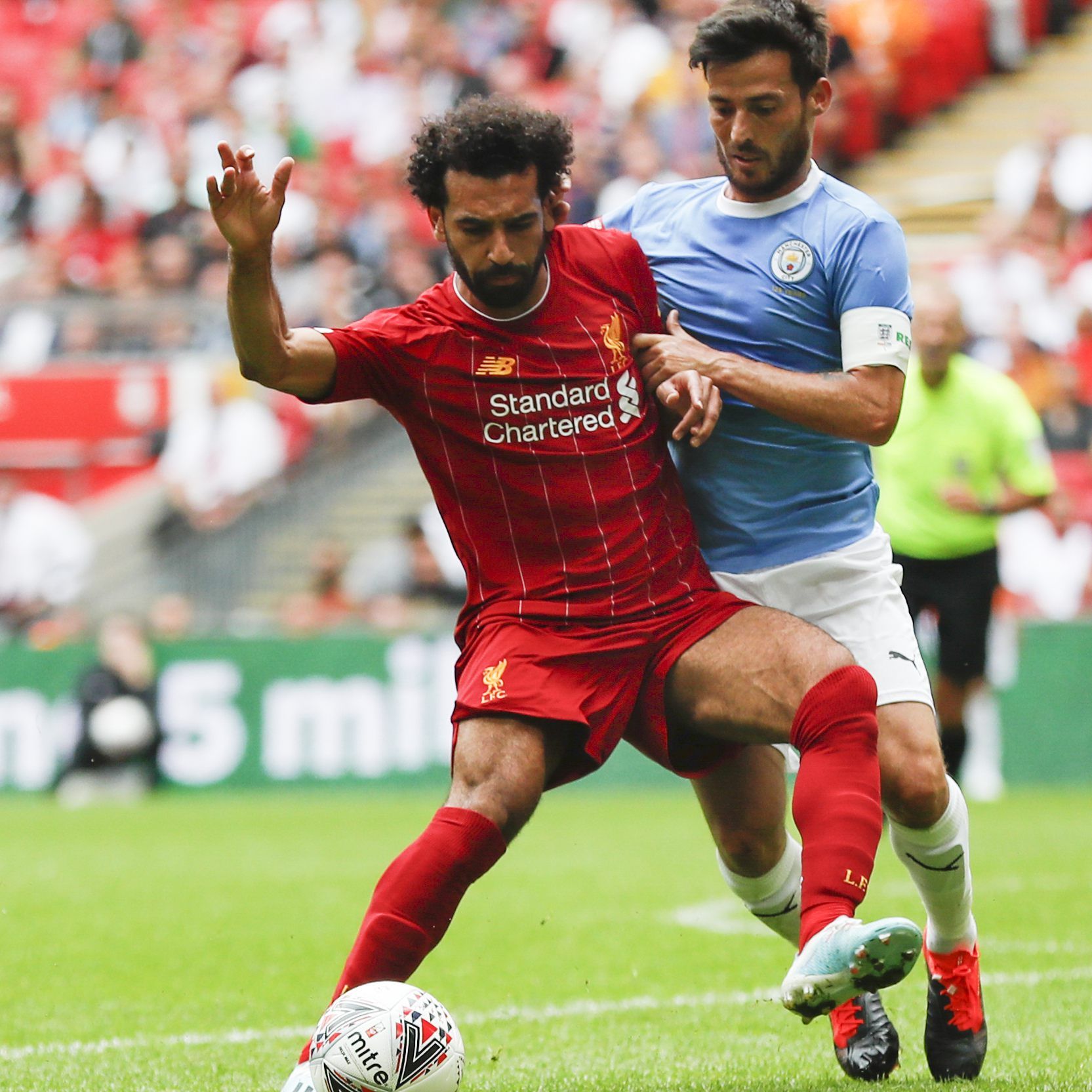 Salah und David Silva im Zweikampfduell
