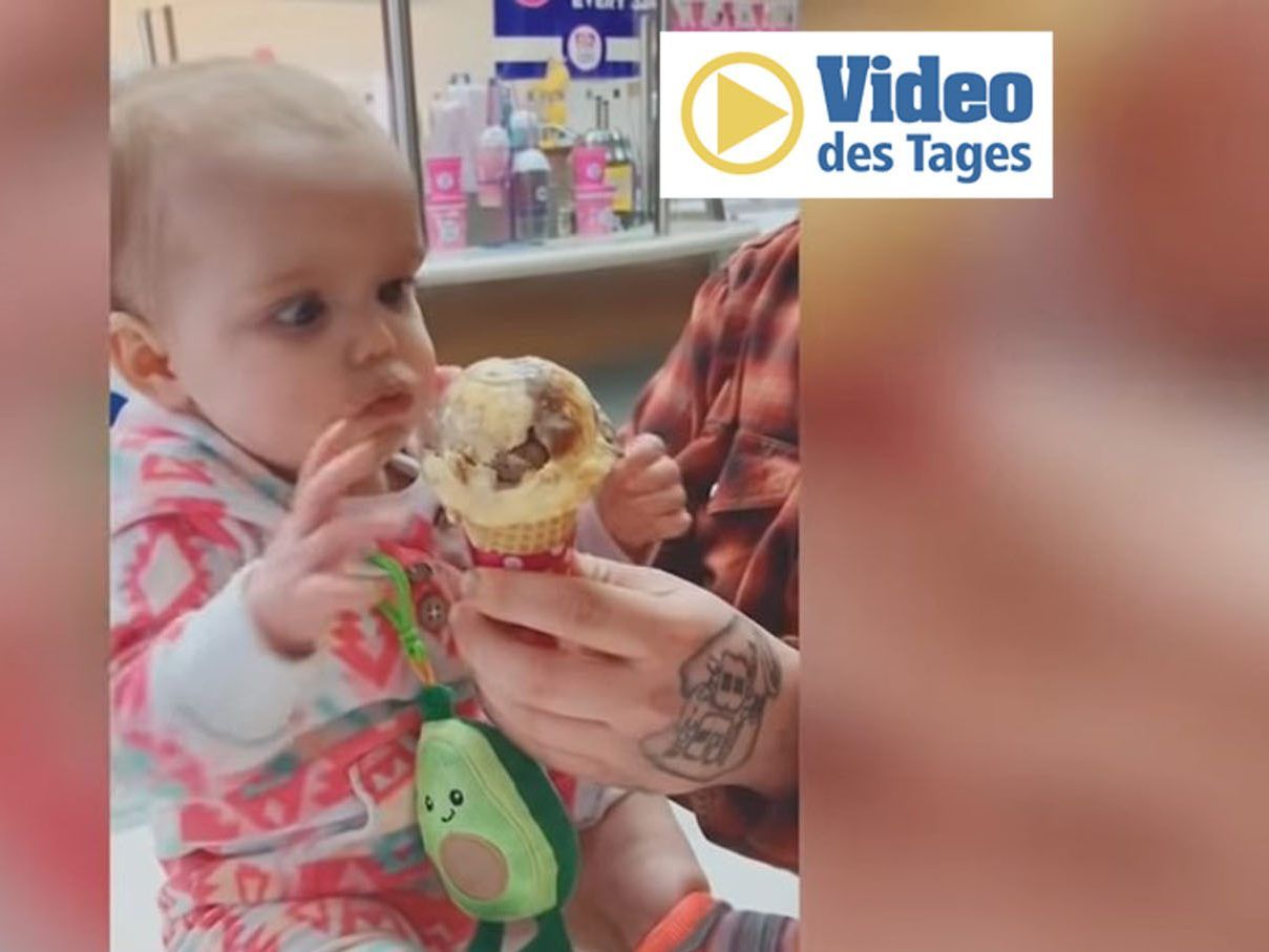 Die erste Eiscreme im Leben dieses Babys.