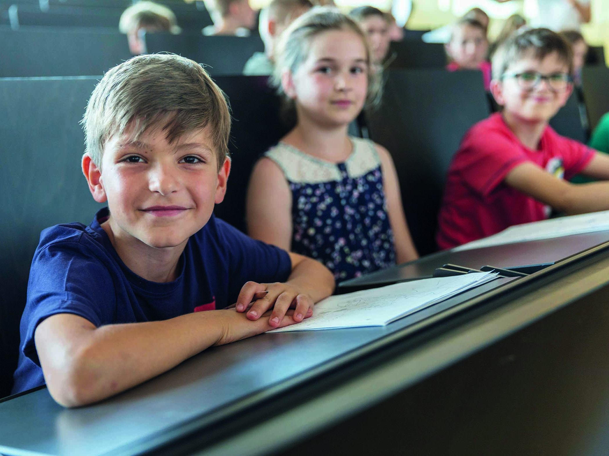 Bei der Kinderuni können sich Kinder, wie richtige Studierende fühlen. Bei der Kinderuni können sich Kinder, wie richtige Studierende fühlen.