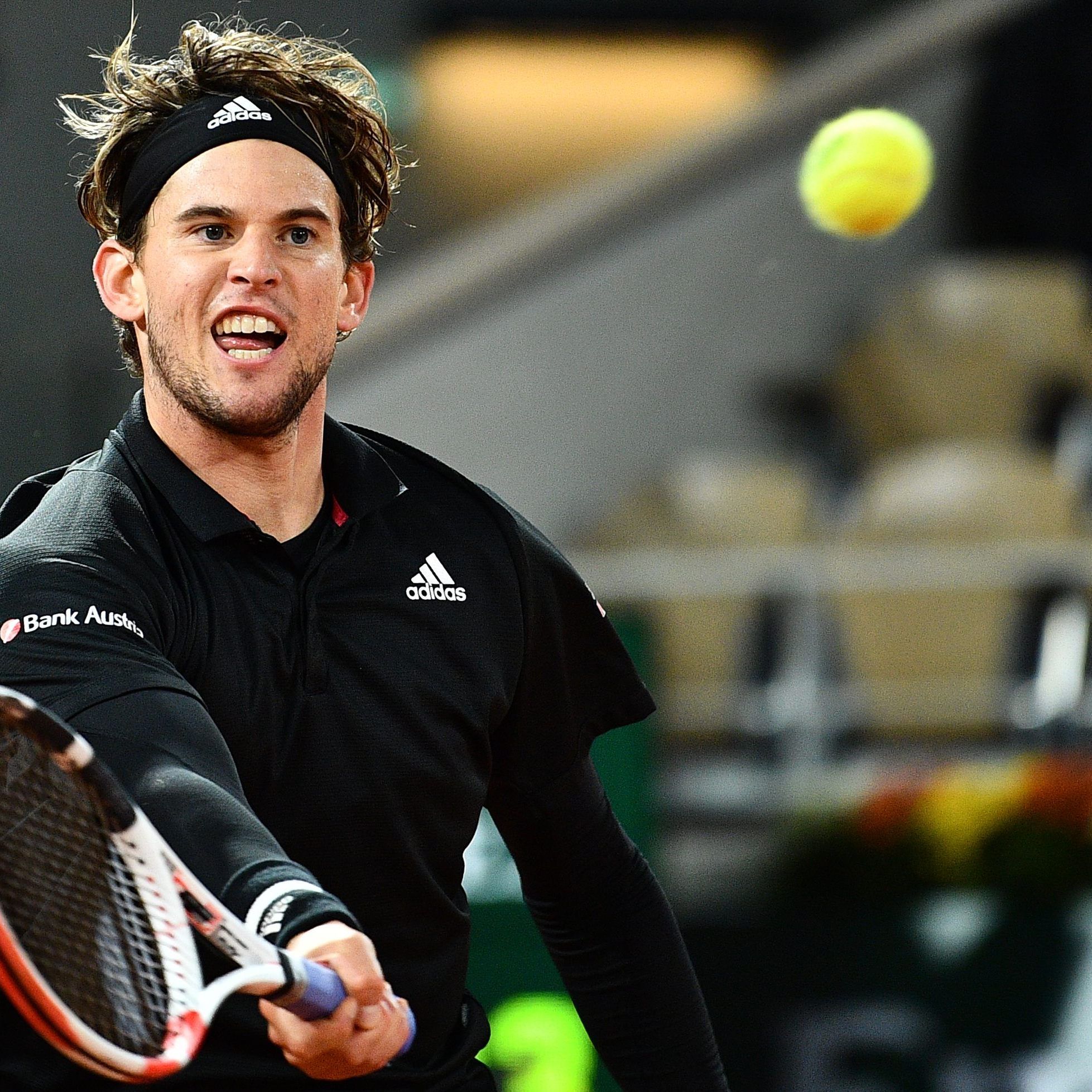 Dominic Thiem returns the ball to Argentina's Diego Schwartzman during their men's singles quarter-final tennis match.