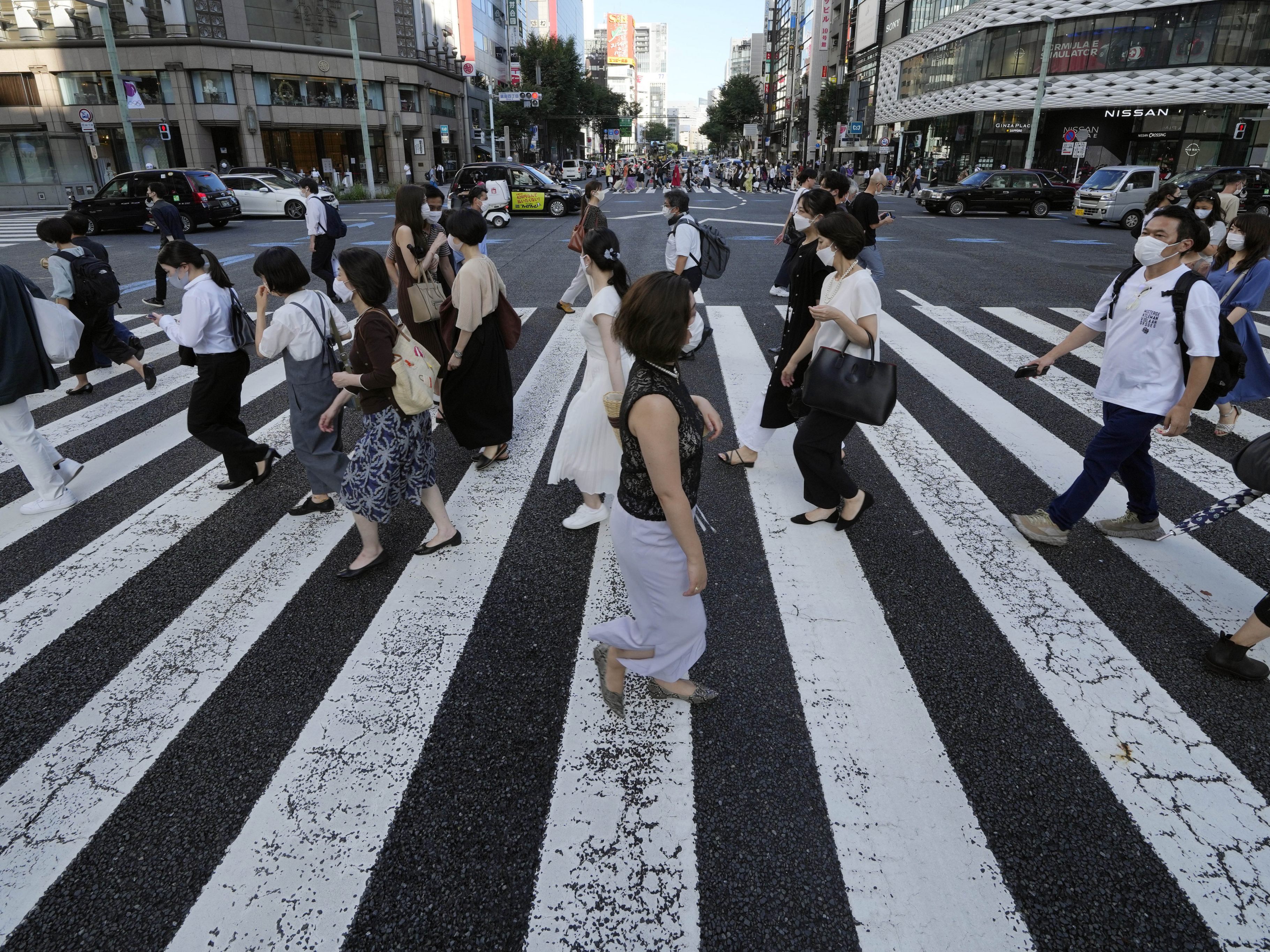 Tokio: Die Zahl der Corona-Neuinfektionen steigt rasant. Tokio: Die Zahl der Corona-Neuinfektionen steigt rasant.