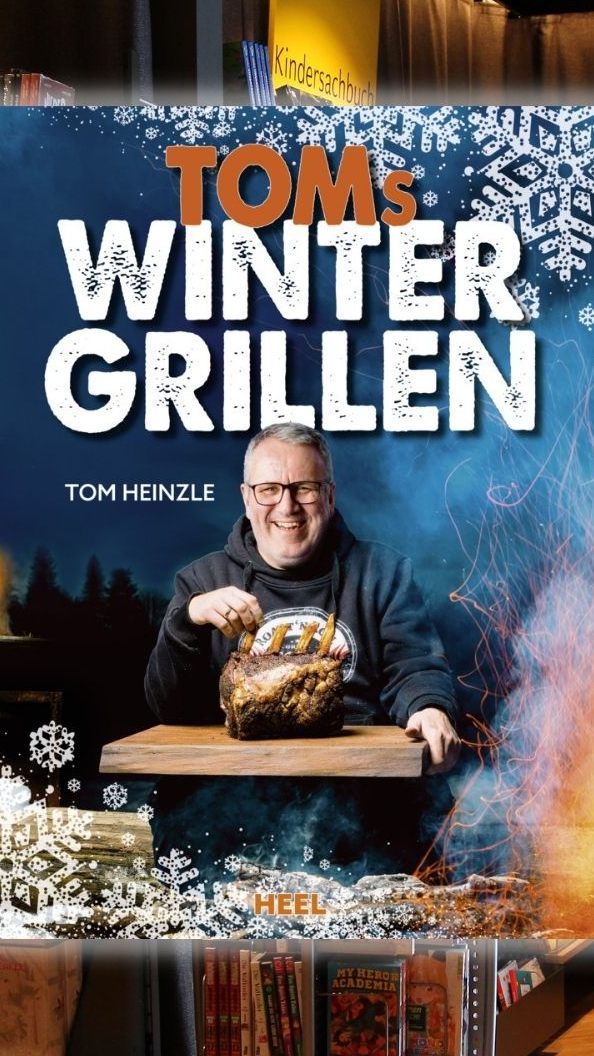 "Toms Wintergrillen" und die Buchhandlung "Das Buch" im Hintergrund.