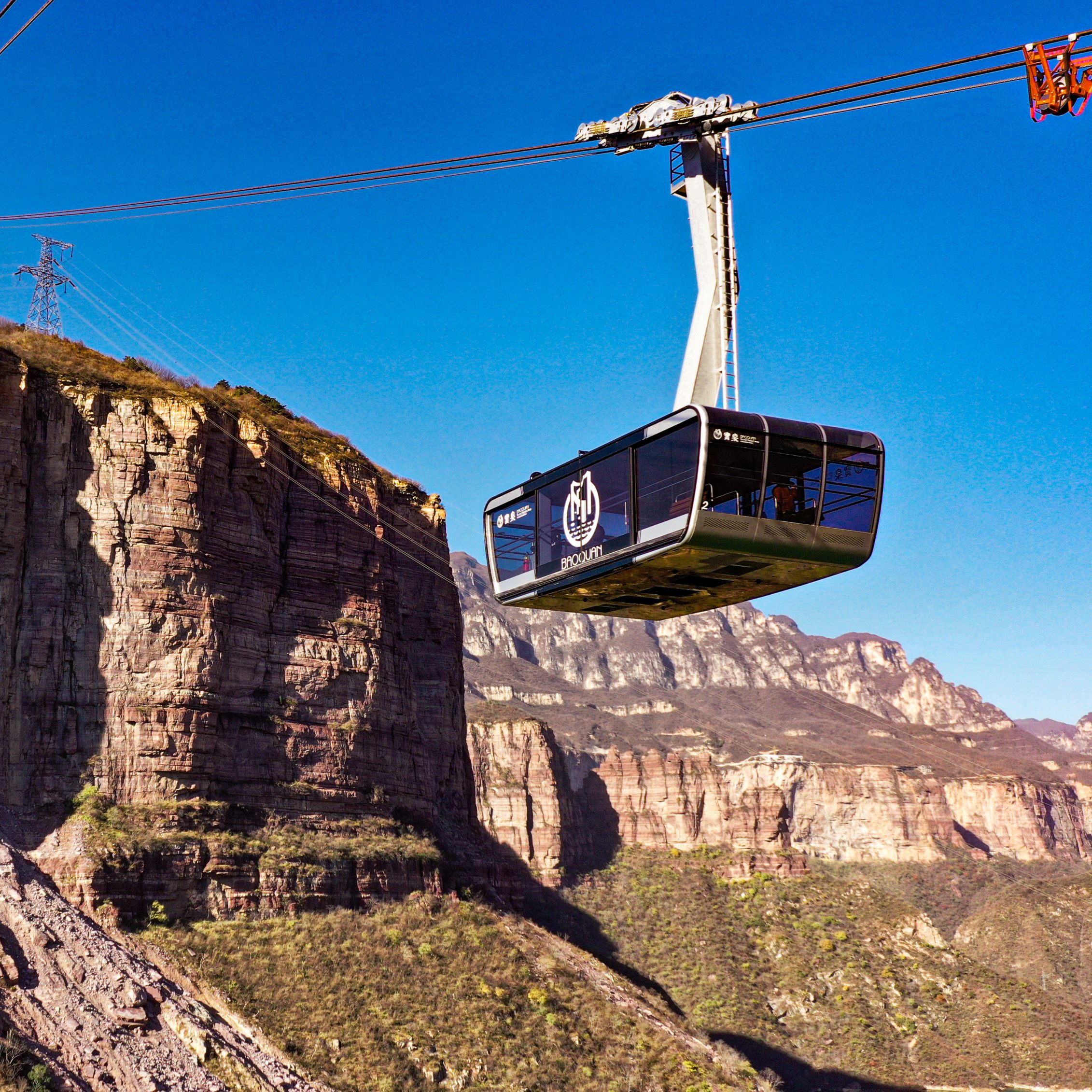 Seit Dezember befördert die größte Pendelbahn Chinas Besucher auf die Anhöhe Baoquan.