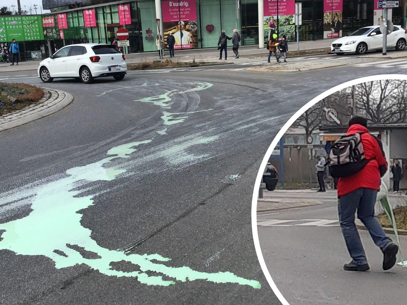 Die Aktivist:innen verschütteten grüne Farbe rund um den Kreisverkehr. Die Aktivist:innen verschütteten grüne Farbe rund um den Kreisverkehr.