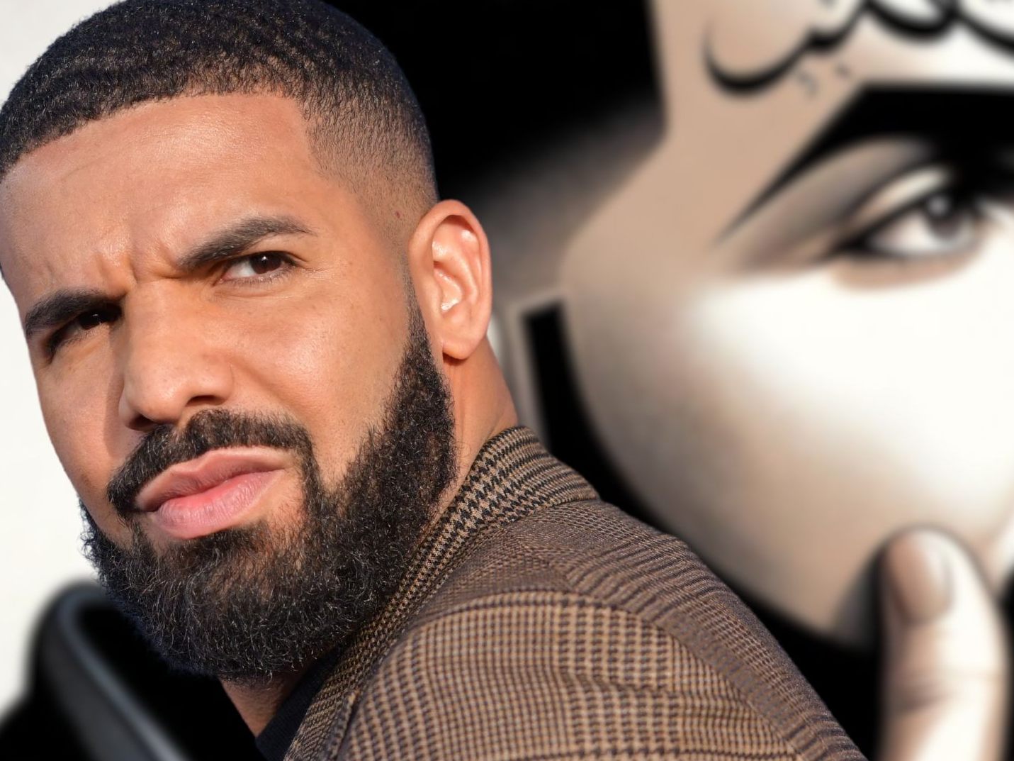 Drake mit erbärmlich Tattoo Drake mit erbärmlich Tattoo