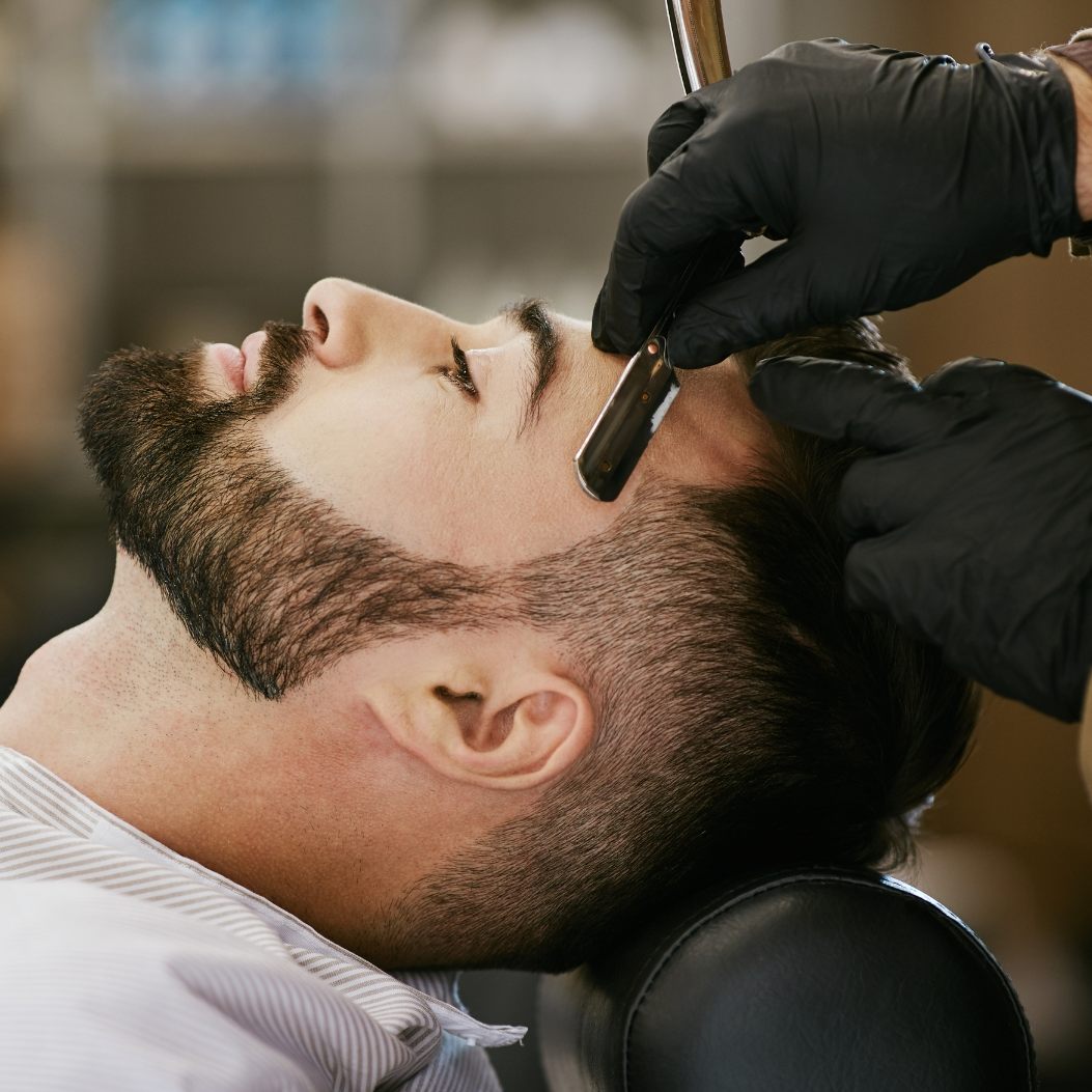 Debatte um Preise für Haarschnitte (Symbolbild)