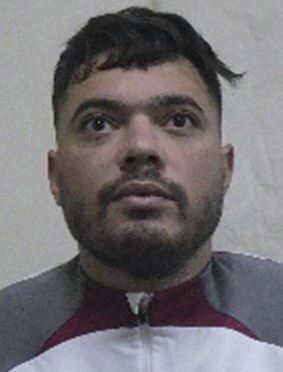 Interpol-Foto zeigt Mohamed Amra, der am 14. Mai 2024 aus einem Gefangenentransport floh, bei dem zwei Beamte getötet wurden. (Interpol via AP) Interpol-Foto zeigt Mohamed Amra, der am 14. Mai 2024 aus einem Gefangenentransport floh, bei dem zwei Beamte getötet wurden. (Interpol via AP)